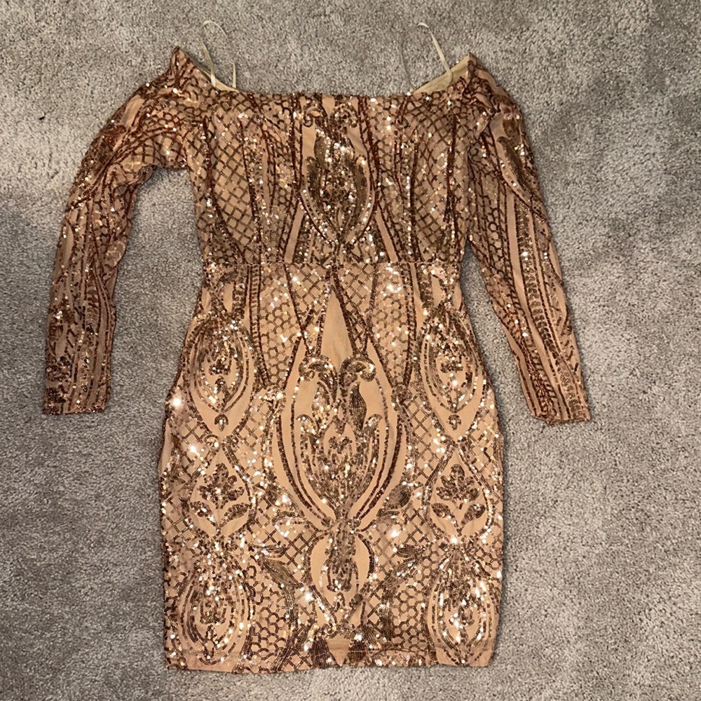 Beautiful brand new off the shoulder rose gold dress.